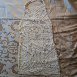 Worn only once and is in excellent condition.